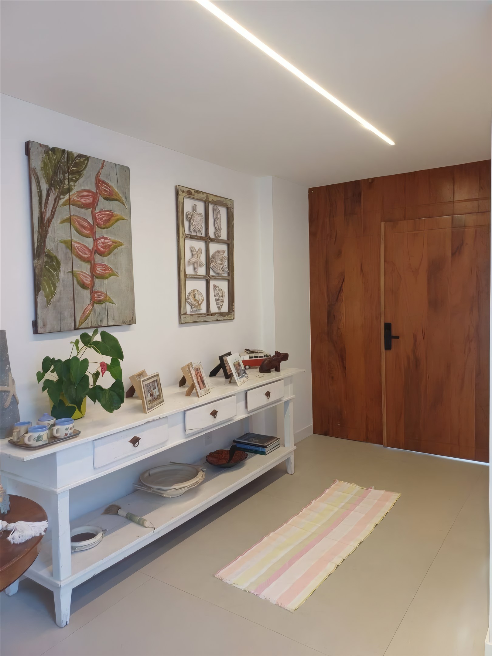 Hall de entrada da casa, obra da Valuà Engenharia